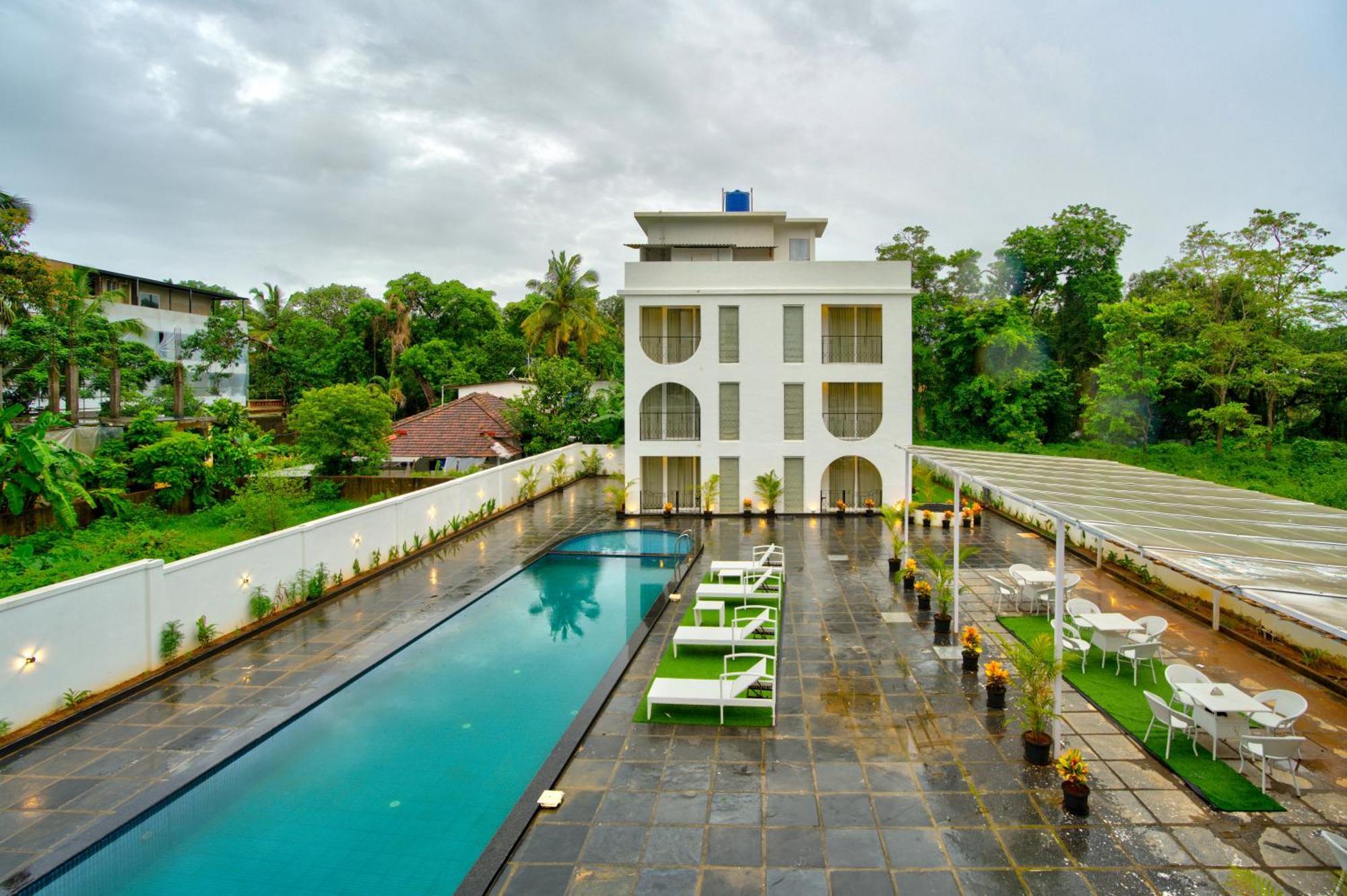 Goa Courtyard By The Porto Arpora Hotel Baga Exterior photo