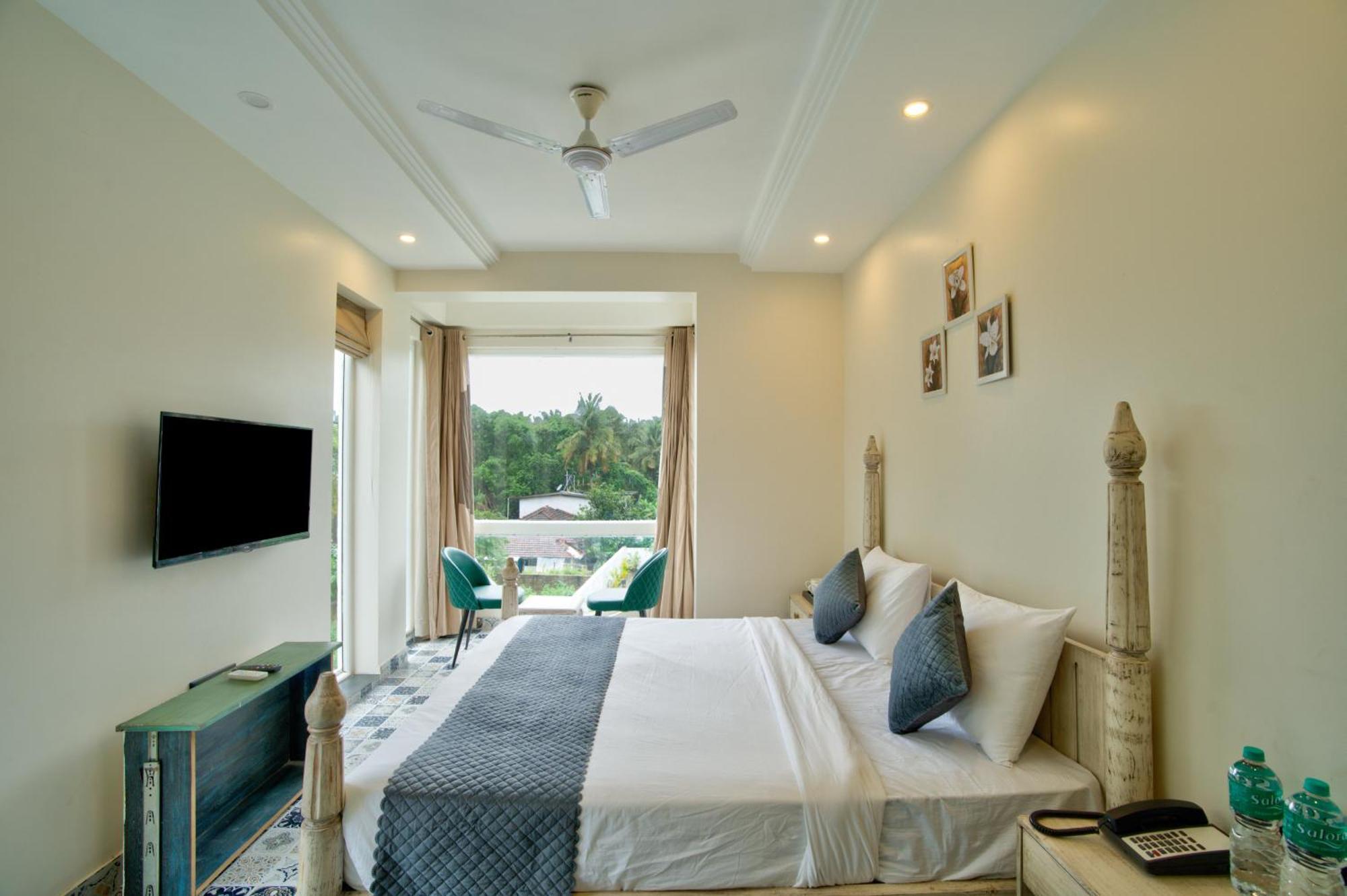 Goa Courtyard By The Porto Arpora Hotel Baga Exterior photo
