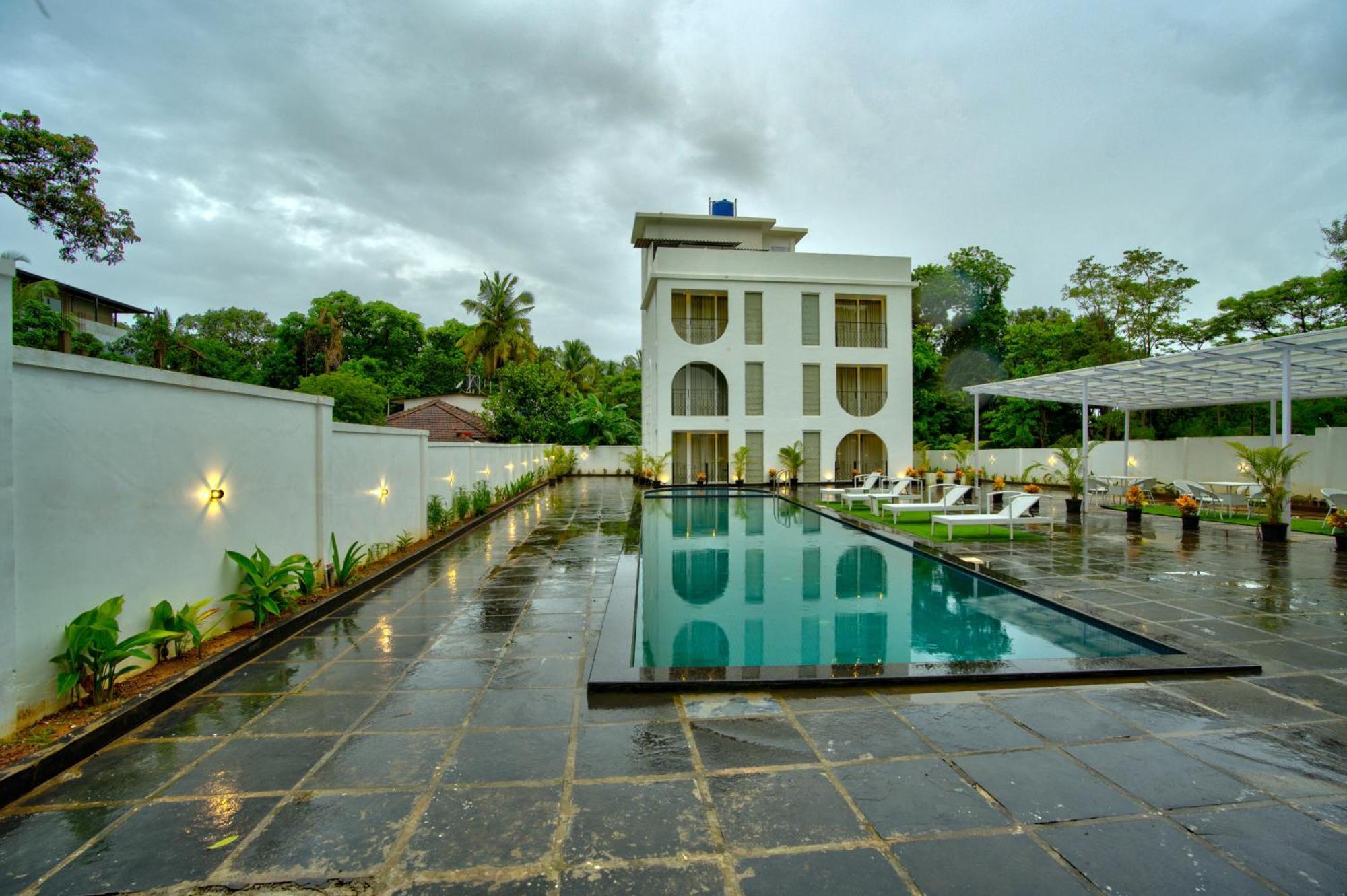 Goa Courtyard By The Porto Arpora Hotel Baga Exterior photo