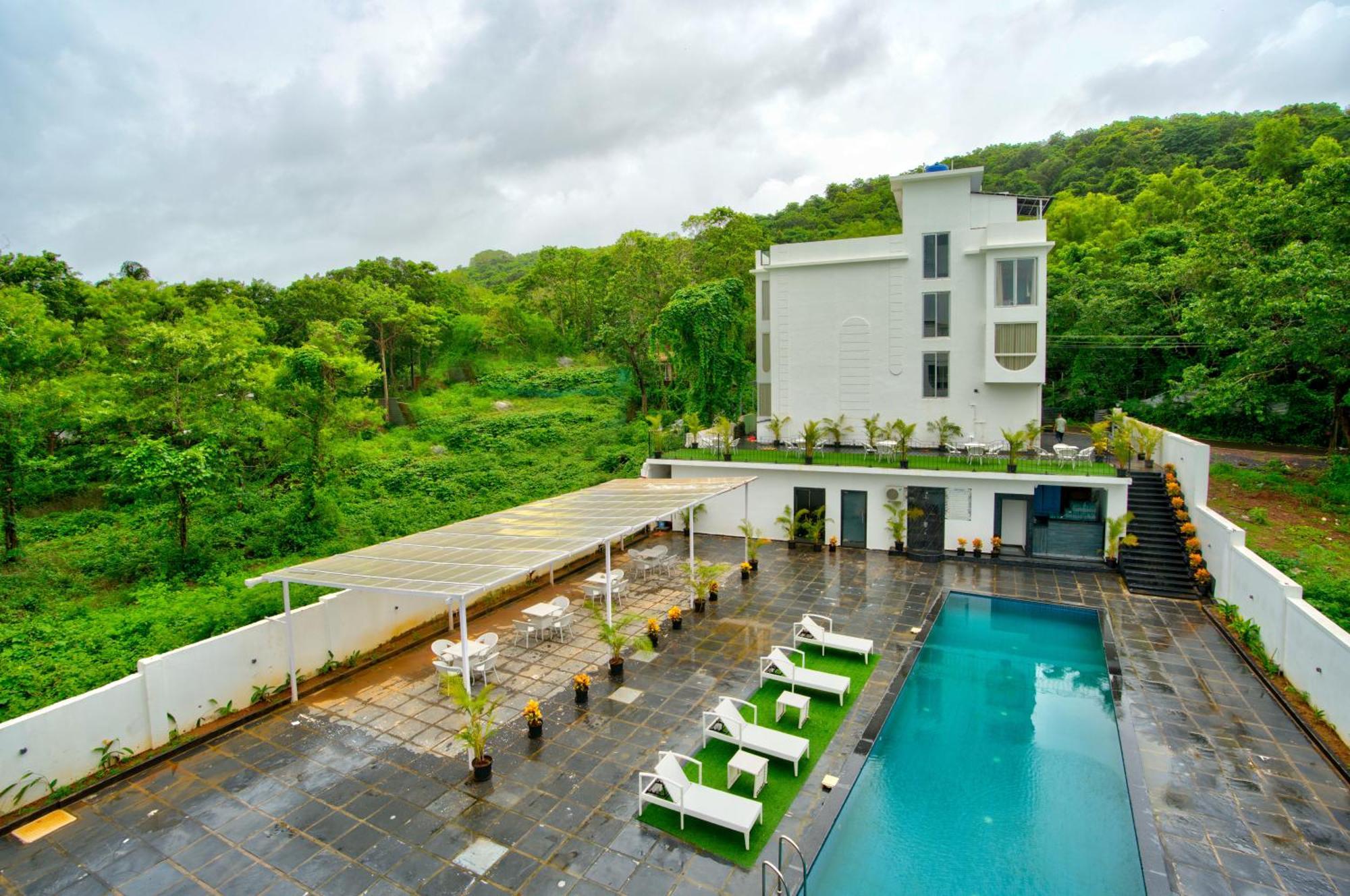Goa Courtyard By The Porto Arpora Hotel Baga Exterior photo